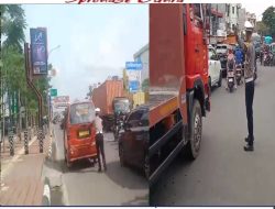 Walaupun Sendirian, Kasat Lantas Polres Gowa Dorong Mobil Angkot Yang Mogok Demi Kelancaran Lalin